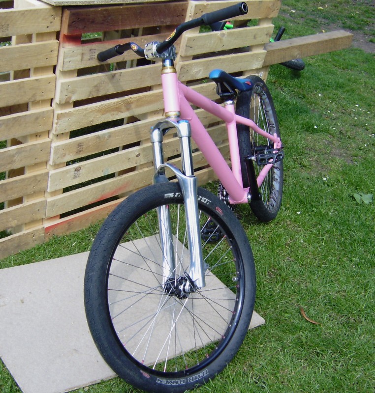 custom build azonic frame, custom bubble gum pink spray job, marz dj2, gussett waffen cranks, v12 pedals, hope headset, funn seatpost an 24/7 seat, sun single track rim with dmr hub front, sun mtx withdmr 6 pawlhub rear, dmr transition 24 tyres, easton monkey bars.
all the work on this i have done myself as i build and repair bike as well as spray them.