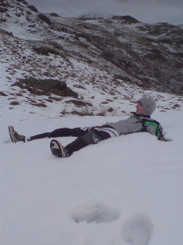 Me laying in the snow after jumping in it :)