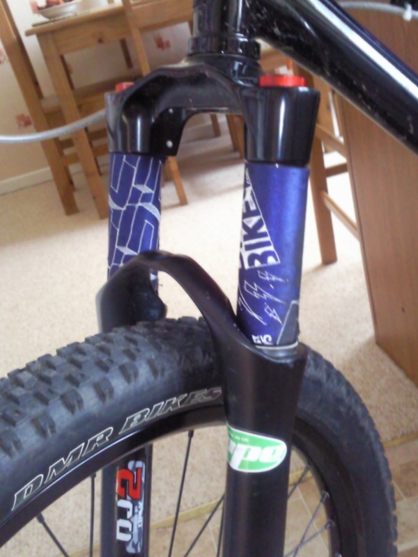 home made stantion protecters from an old dmr chainstay :) and dont look that bad neither haha.