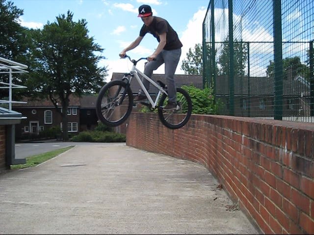 180 drop, if you see the location you'd realise that it is a 180 and not riding off a wall haha (rotate left + rh foot forward)
