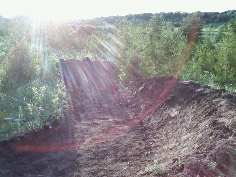 The first berm and take off for the first table of the pump track are built.