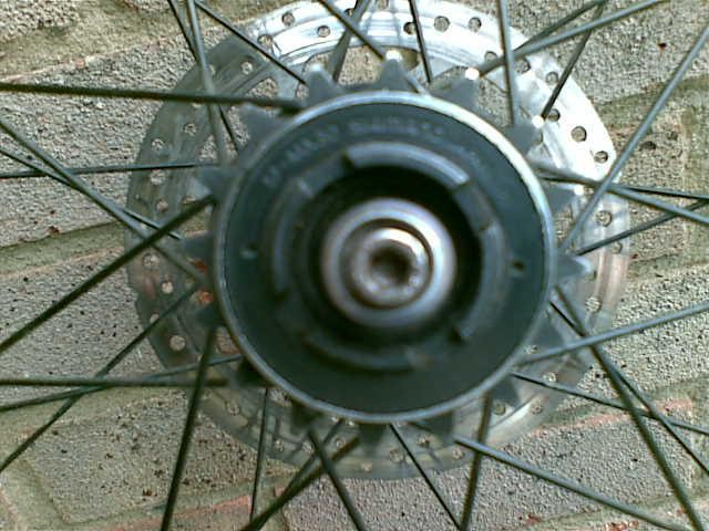 24" DMR DV rim on DMR Revolver Bolt on hub with Shimano MX30 Freewheel, only £35 posted, includes hayes disc rotor.
