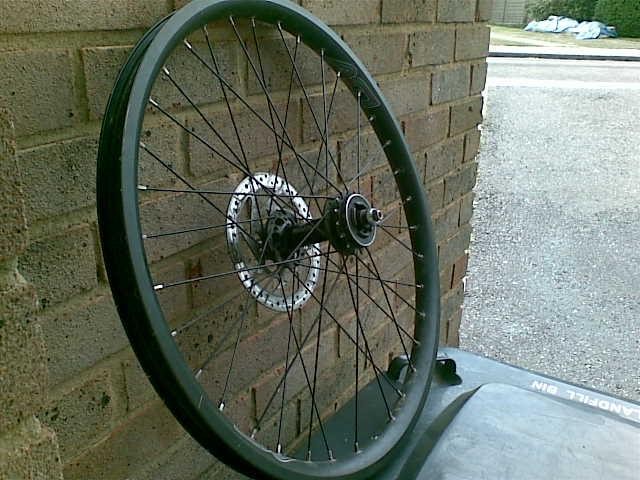 24" DMR DV rim on DMR Revolver Bolt on hub with Shimano MX30 Freewheel, only £35 posted, includes hayes disc rotor.