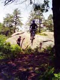 Greengo launching 7+footer This is huge for our little core of riders. I'm 6'5" without my helmet to get an idea of the height. Bow Ridge has many of these drops. The Ridge is f'n awesome!