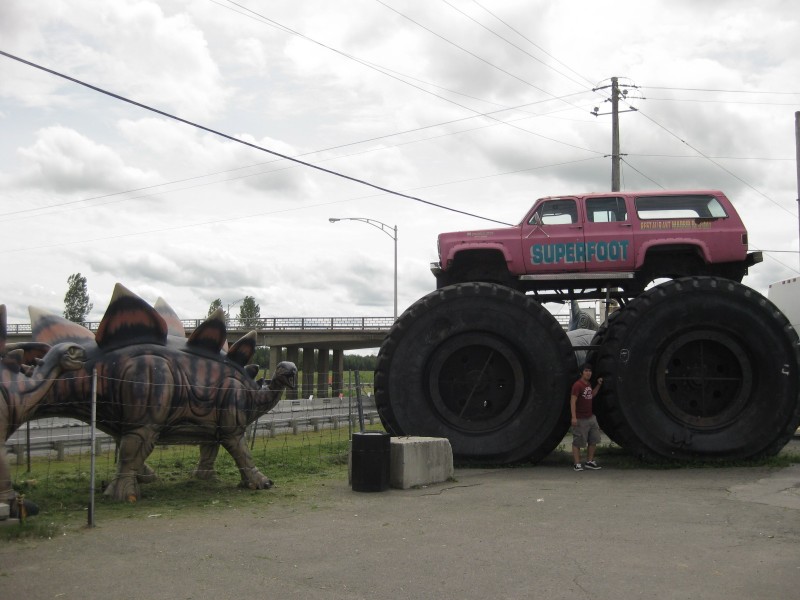Dinosaurs and Monster trucks at a random rest stop in Quebec.