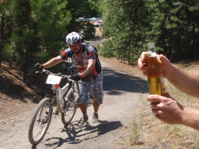 Some of the riders needed an extra incentive to get up the hill.  We're pretty sure he didn't finish the race.