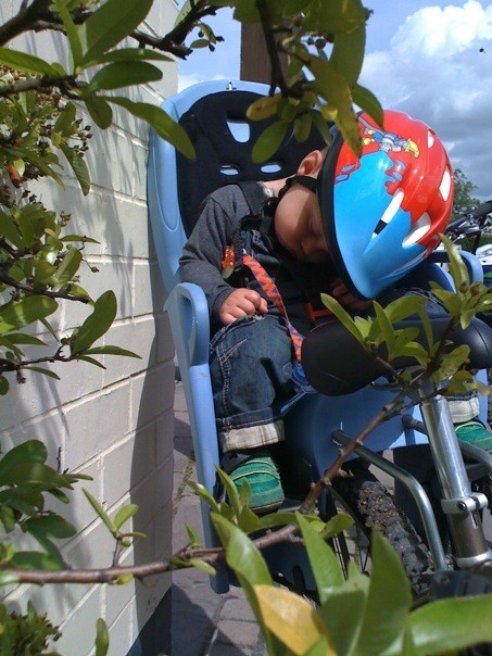 Elijah asleep after the ride today - this is when we stopped at the pub