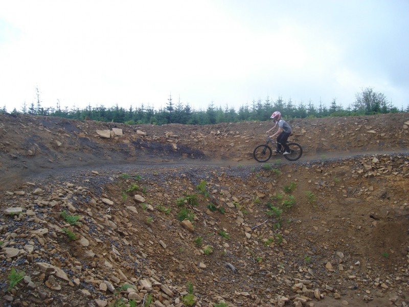 John doing a berm on the new trail at hammers. I took the photo a bit early though.
