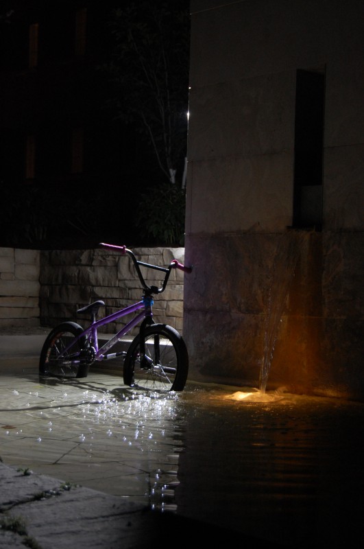 My bike beside the waterfall, various flash positions.