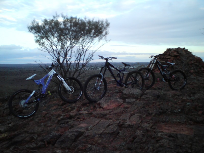 me and my 2 friends bikes.      speciaized bighit, kona stinky, norco team DH