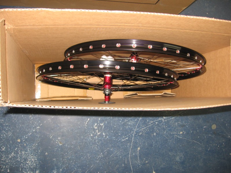 custom wheels: NS hubs, dt swiss spokes, red alloy nipples, mavic729 rims