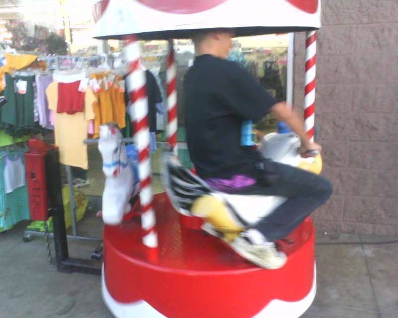 Im riding a 25 cent meryy-go-round