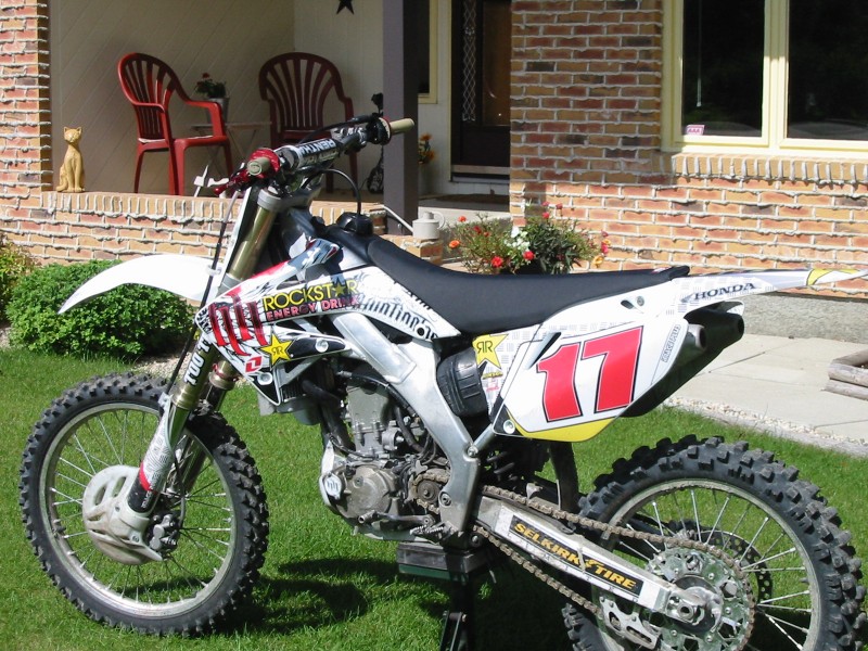 RK racing Chain
White plastics
Hart and huntington graphics
Renthal bars
Asv levers
Factory effex seat cover
Too Tech suspension
holeshot button