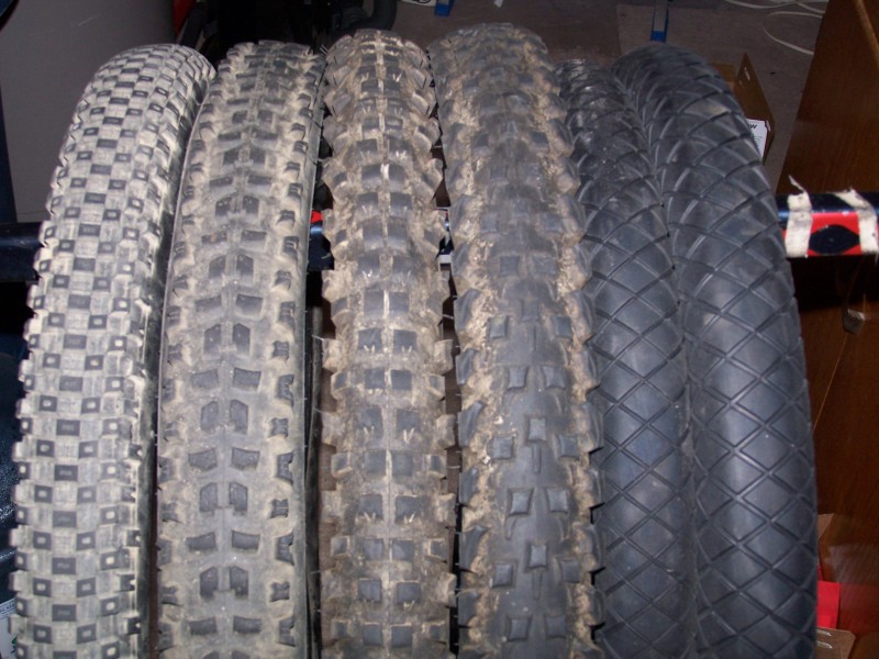 Left to Right:

DMR Moto Digger 26"x2.35" - $15
Michelin Nagesti Tubless 26"x2.50" - $20
Vee Racing E-Compound 24"x2.30" - $20
Nokian Gazzaloddi JR. 24"2.60" - $20
Primo The Wall 20"x1.85" - $15
Primo The Wall 20"x2.10" - $15