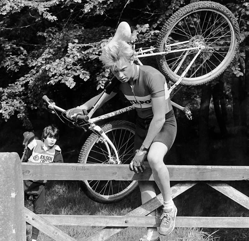 1985 - Posed pic for local paper after winning race. A young Andy Oldham in the background. Was this the first MTB race victory in  skinsuit?