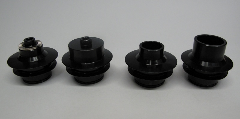 Front hub axle conversions from Left: Standard QR, Specialized 0S28, 15 mm thru-axle, 20 mm thru-axle