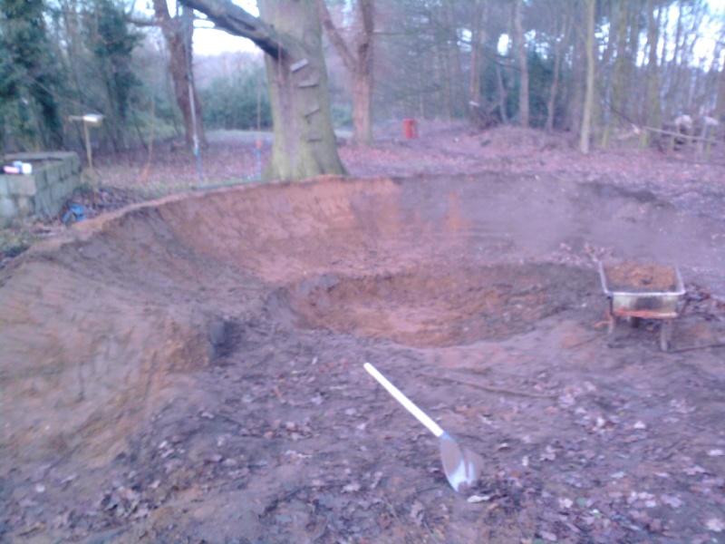 The pump track 180 berm. hollowing out middle so it can flood:)