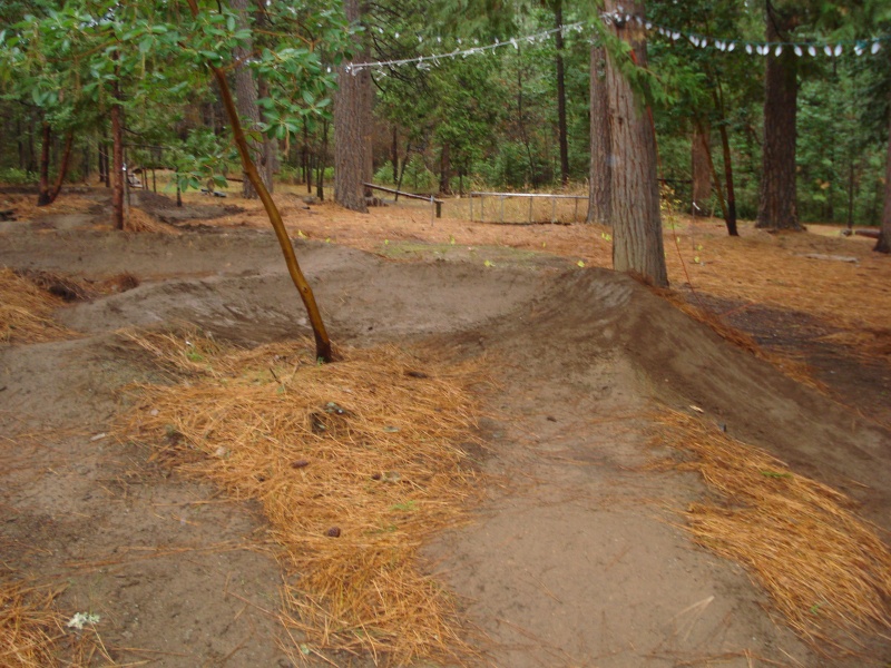 berm and entrance to lower track