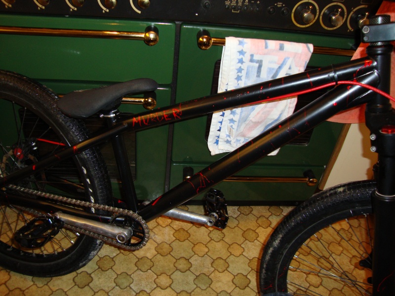cant really see too much but my fresh painted bike.. satin black with blood splats on it