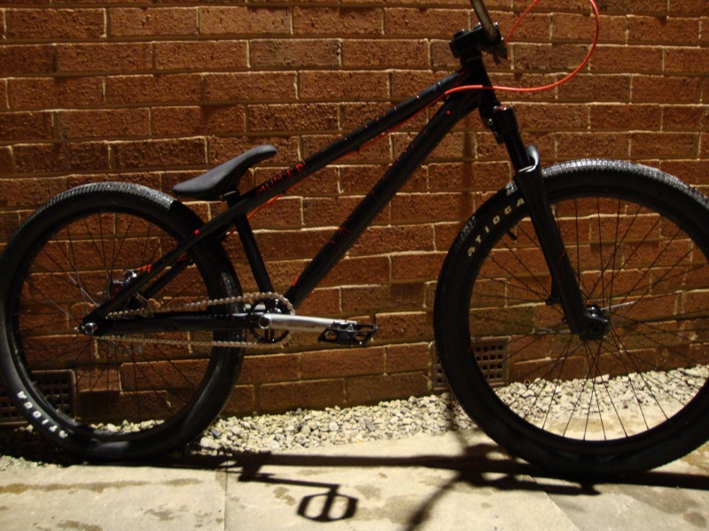 cant really see too much but my fresh painted bike.. satin black with blood splats on it