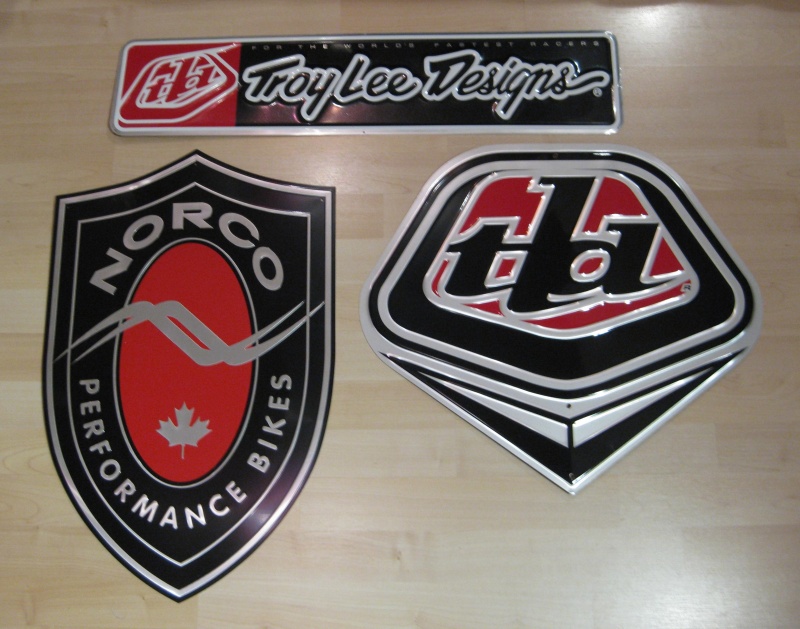 Pressed tin troy lee and norco logo's