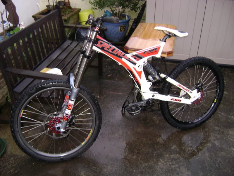 Now running new 09 888 RC3X WC as my slata's went pop in Whistler... Specialized S works DH 2001(shoddy photo)