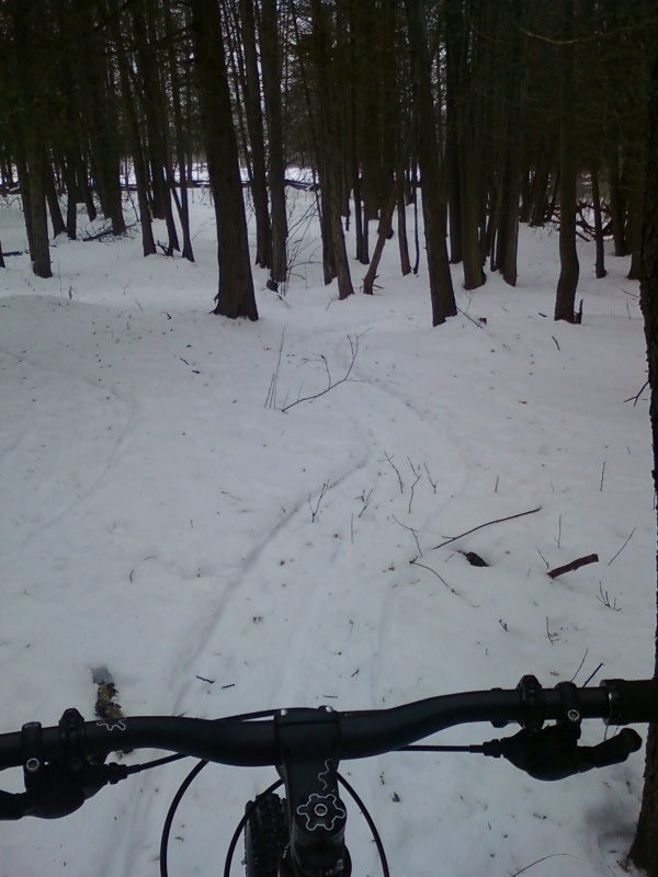 Riding some single track loops I packed with my snow shoes.