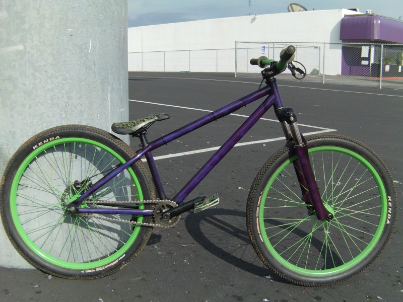 09 NS Suburban done painting it finally. I did a wannabe foggy effect with the purple, Its suposed to look like that.  black, purple, blue then purple on the frame. black purple, white, then purple on the fork.