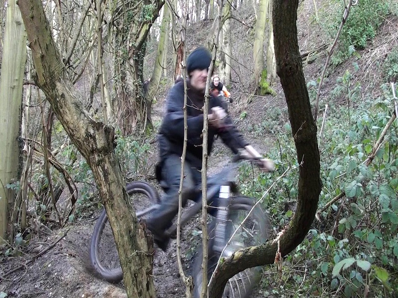 Going pretty fast around the burm, about to hit his Leg on the tree :P