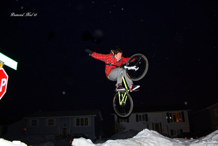 tuck no off the snow jump
photo by des noel