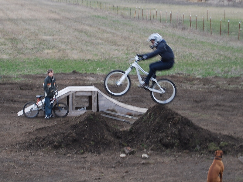 my dad trying the dirt jumps with his down hill bike.