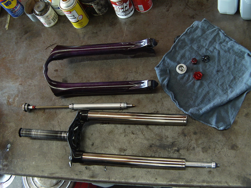 Mostly dissasembled Marzocchi 4X/WC fork. Now to lower it 15mm and put fresh oil in it.