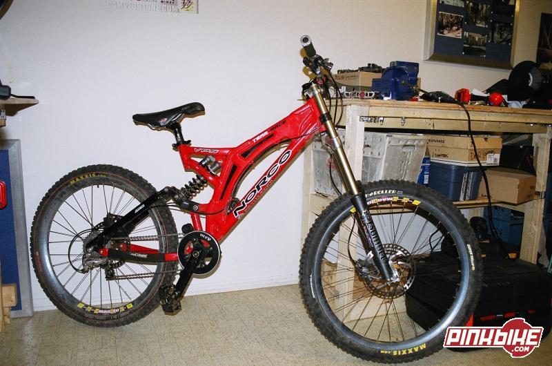2003 Norco Team DH small
Fox Vanilla RC ProPedal
2003 Marzocchi SuperT Pro
MRP Bones 3 piece crank/chainguide combo
RaceFace Diabolous seatpost, Axiom DH saddle
New Formulas laced to Mag 30's
Easton EA70 bar, ODI Ruffian's
Blackspire 38t ring, SRAM cassette
Tiagra road derailleur
Hayes Mag 8" brakes
spare set of seat stays
all bearings replaced this winter
fork rebuilt