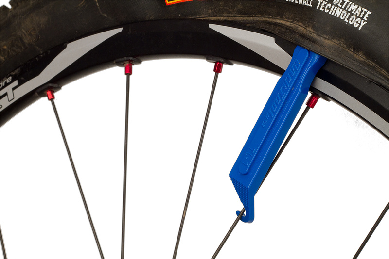 First lever installed and hooked onto a spoke, freeing up both hands