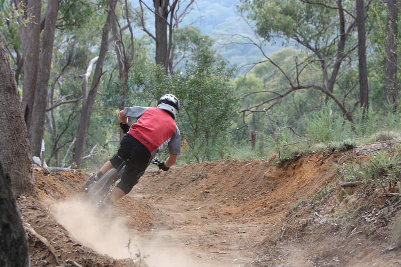 Packing down the dusty berms.