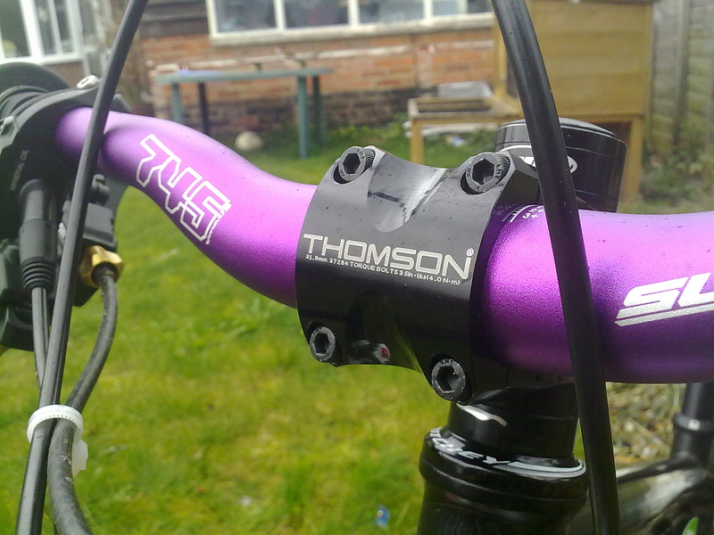 Thomson X4 stem and sunline v1 purple bars