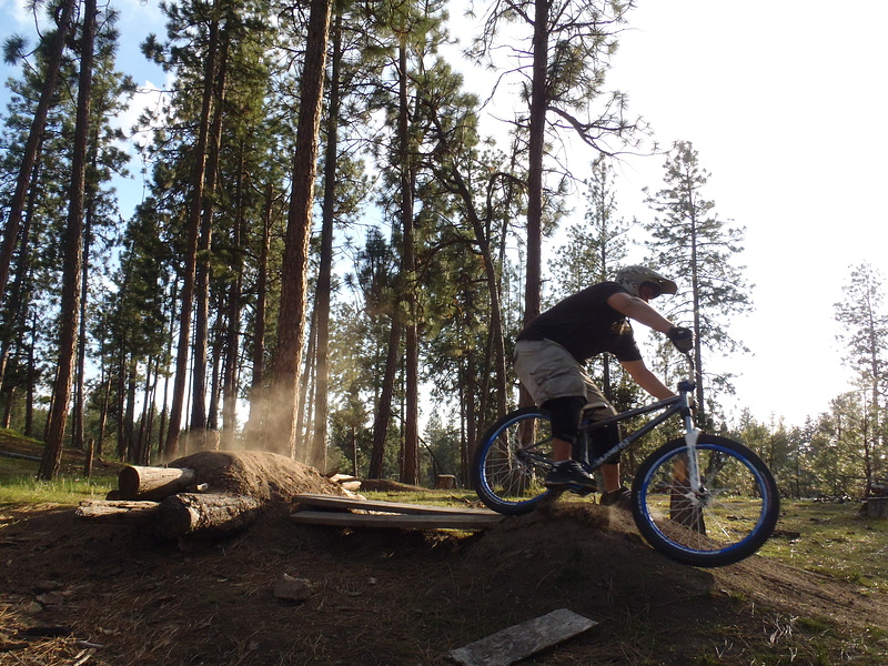 Me Casing it pretty good, lol new bike, going from full squish to hard tail is learning all over agian. haha