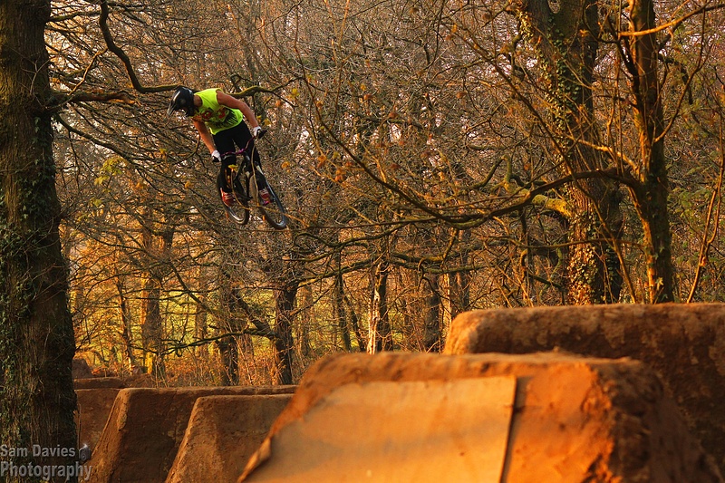 Danny Pace throwing a big 360 over the pristine Moos trails.