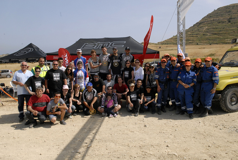 Race crew, riders spectators and the mountain rescue team