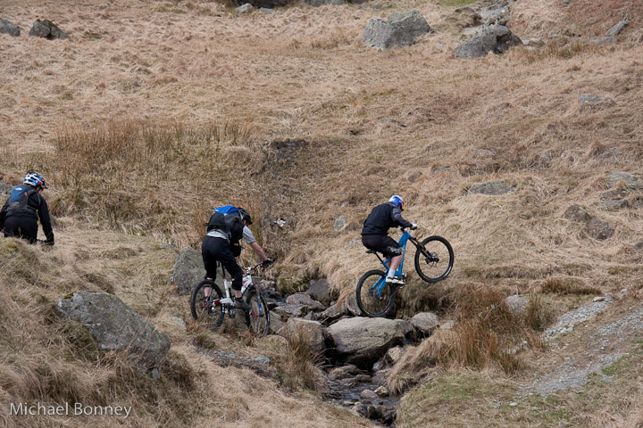Macaskill dominating the stream crossing!
