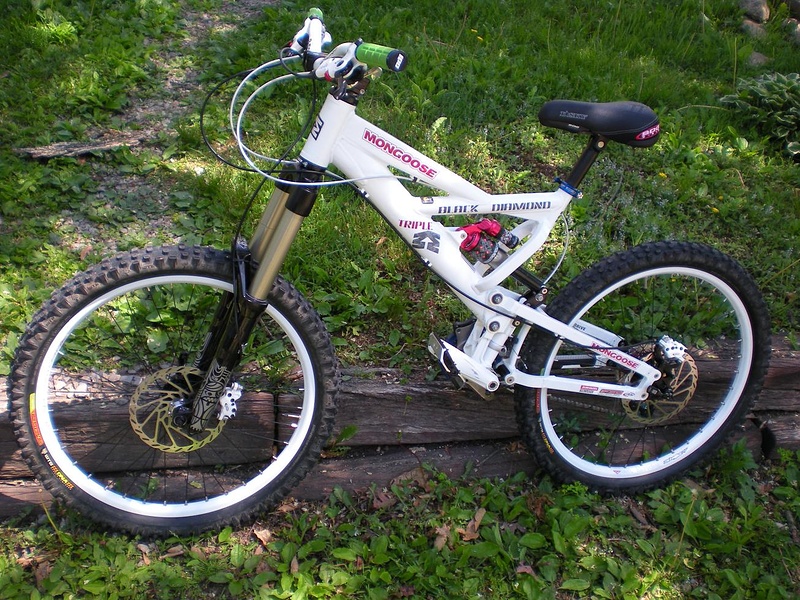 My Custom 2007 Mongoose Black Diamond Triple. New parts this season: Totem Solo Air, Marzocchi WC Air rear shock, SDG I-Sky Saddle and Post.