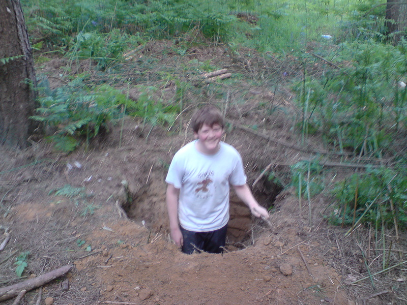 lawrence in the hole we used to build  the berm with