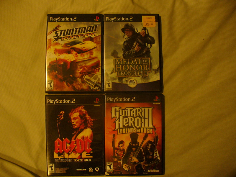 Play Station 2 games    Stuntman Ignition ... 5$  Medal Of Honor Frontline ... 5$ AC/DC for rockband ... 7$ Guitar Hero 3 ... 10$