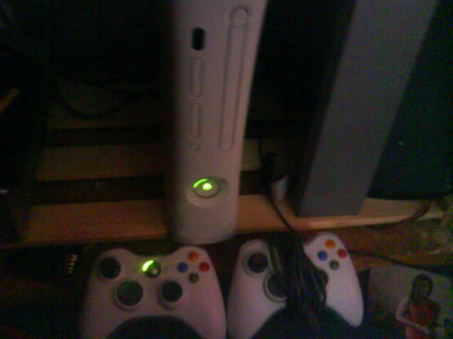 xbox 360 with a hard drive and 2 contlors