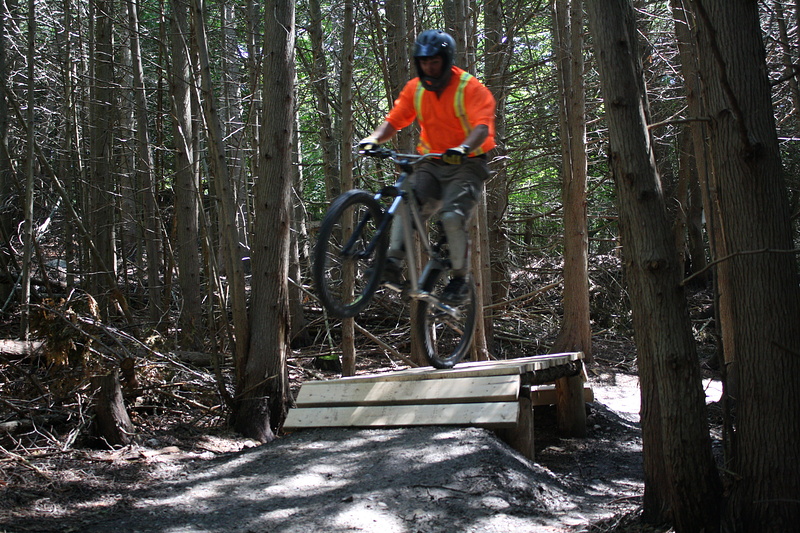 bails rides on one wheel.  blue square trail