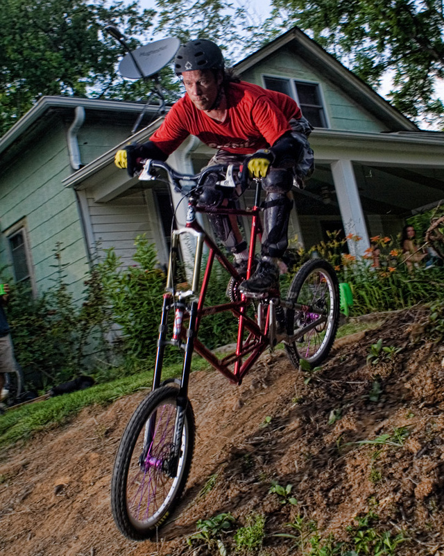 Micheal Moonie on his 6 ft tall full suspension bike