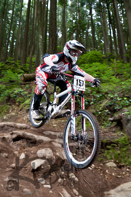 Kip Shortreed going over some roots and rocks