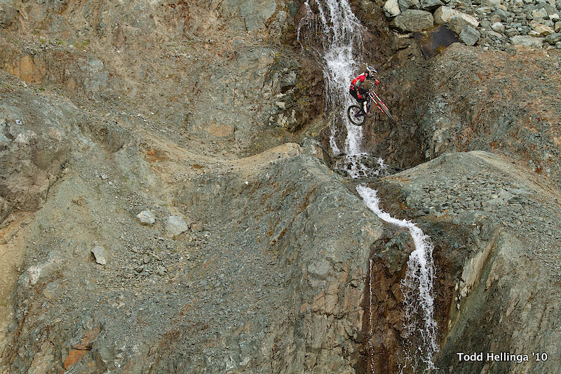 Paul hucks a sweet gap over a waterfall.