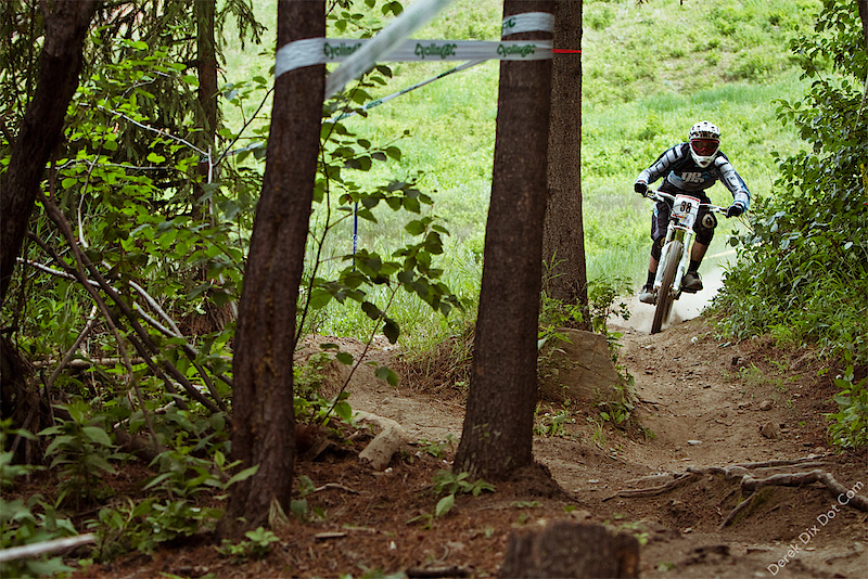 Dropping back into the trees after the hip at the top of the course.