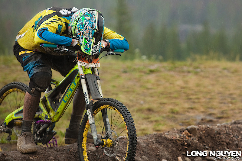 Kevin Aiello takes a breather after finishing is final Downhill run.

Colorado Crankworx Downhill Pro Finals